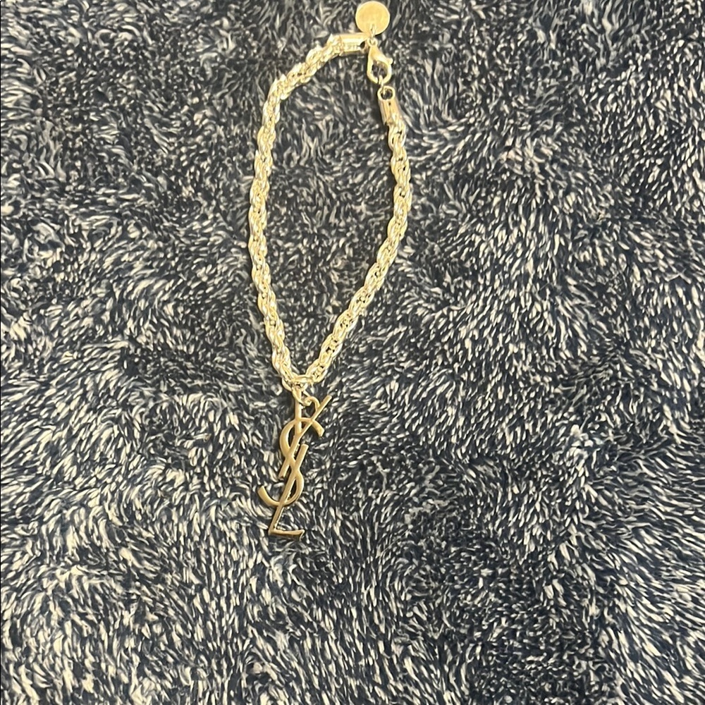 Elegant SS Bracelet with Iconic Charm